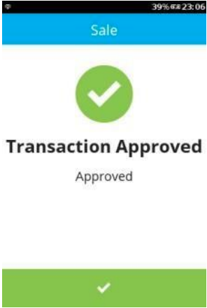 transaction approved message on terminal screen with large green tick